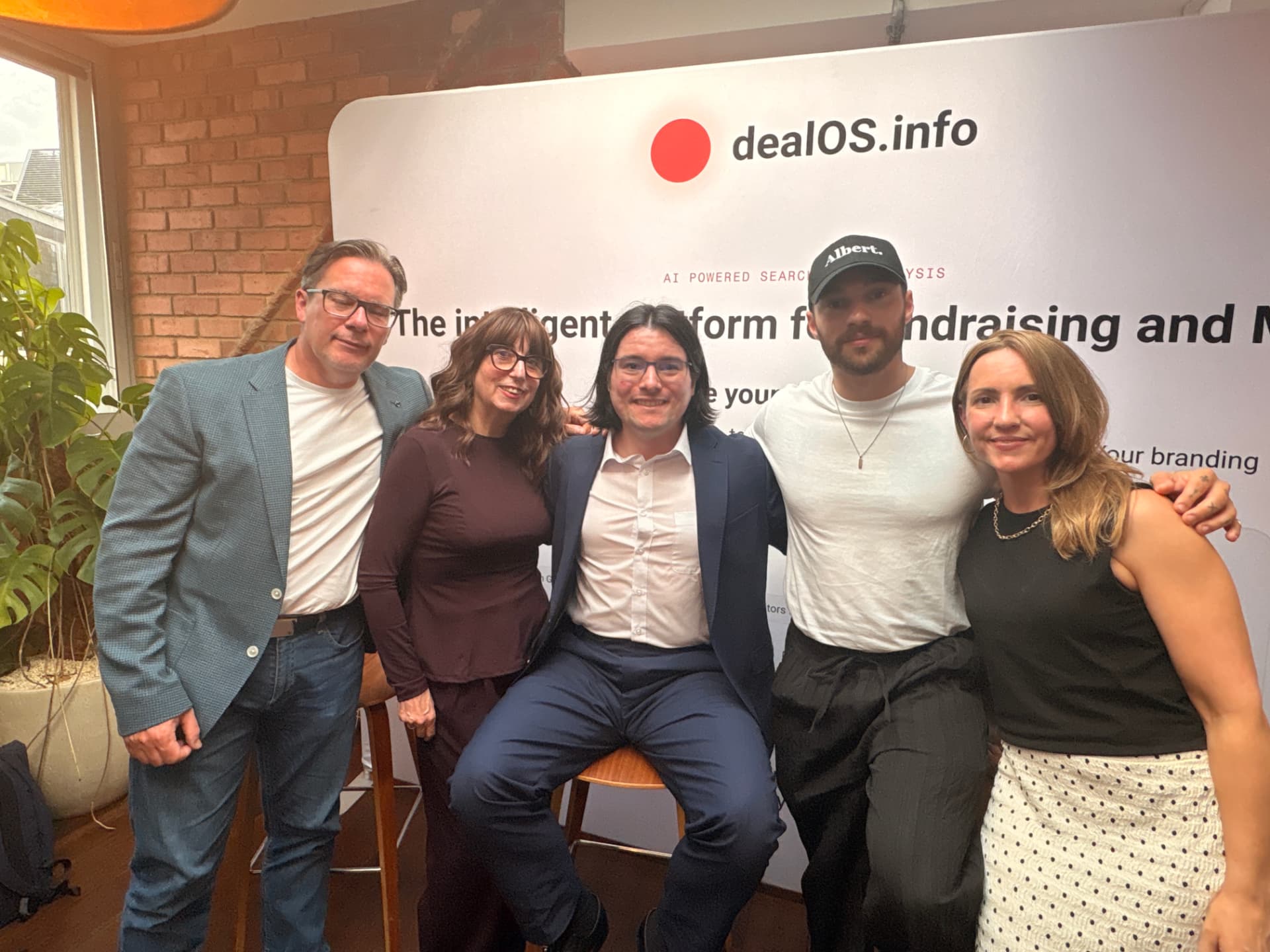A group of founders and partners posing together after an event